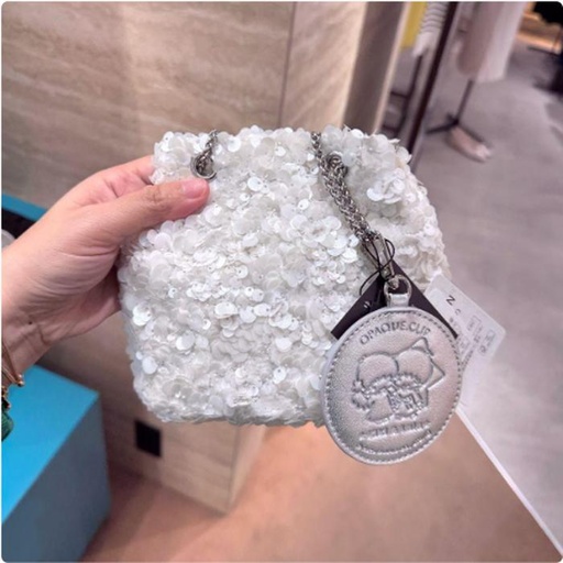 [3/4/2025-16:26-785] Kiki & Lala 2 Way Sequin Drawstring Mini Shoulder Bag Uk 15 X 10 X 16 Cm White